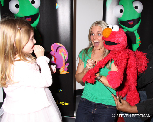 children0025.jpg - Terri and daughter Julia with Elmo at the opening night of ImaginOcean on March 31, 2010 at New World Stages, New York City, New York (Photo by Steven Bergman)